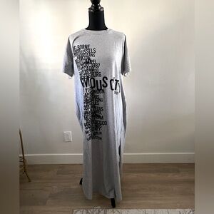 New with tags!
Long T shirt dress with side Slits